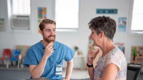 Therapist Engaging With Patient During Occupational Speech Therapy Session