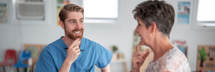 Therapist Engaging With Patient During Occupational Speech Therapy Session