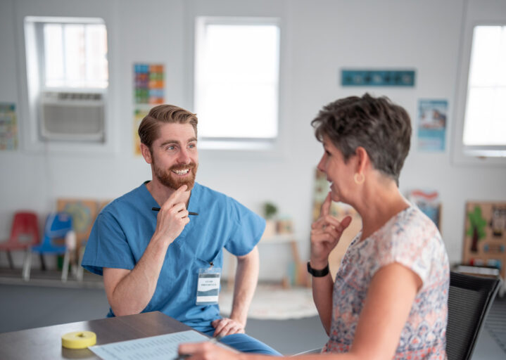 Therapist Engaging With Patient During Occupational Speech Therapy Session